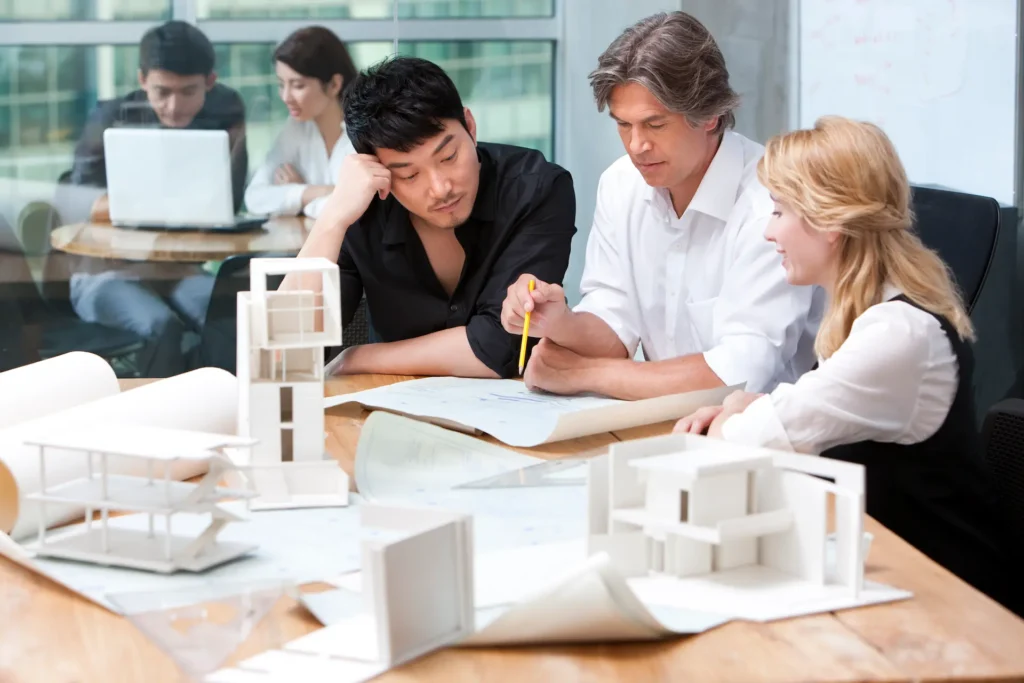 architects studying a blueprint 2024 10 17 05 15 54 utc 1